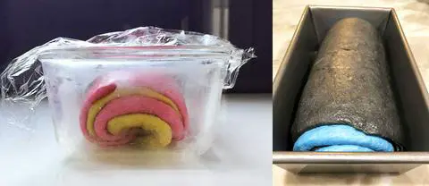 two loaves of swirled bread dough in their bread pans, ready for the second rise