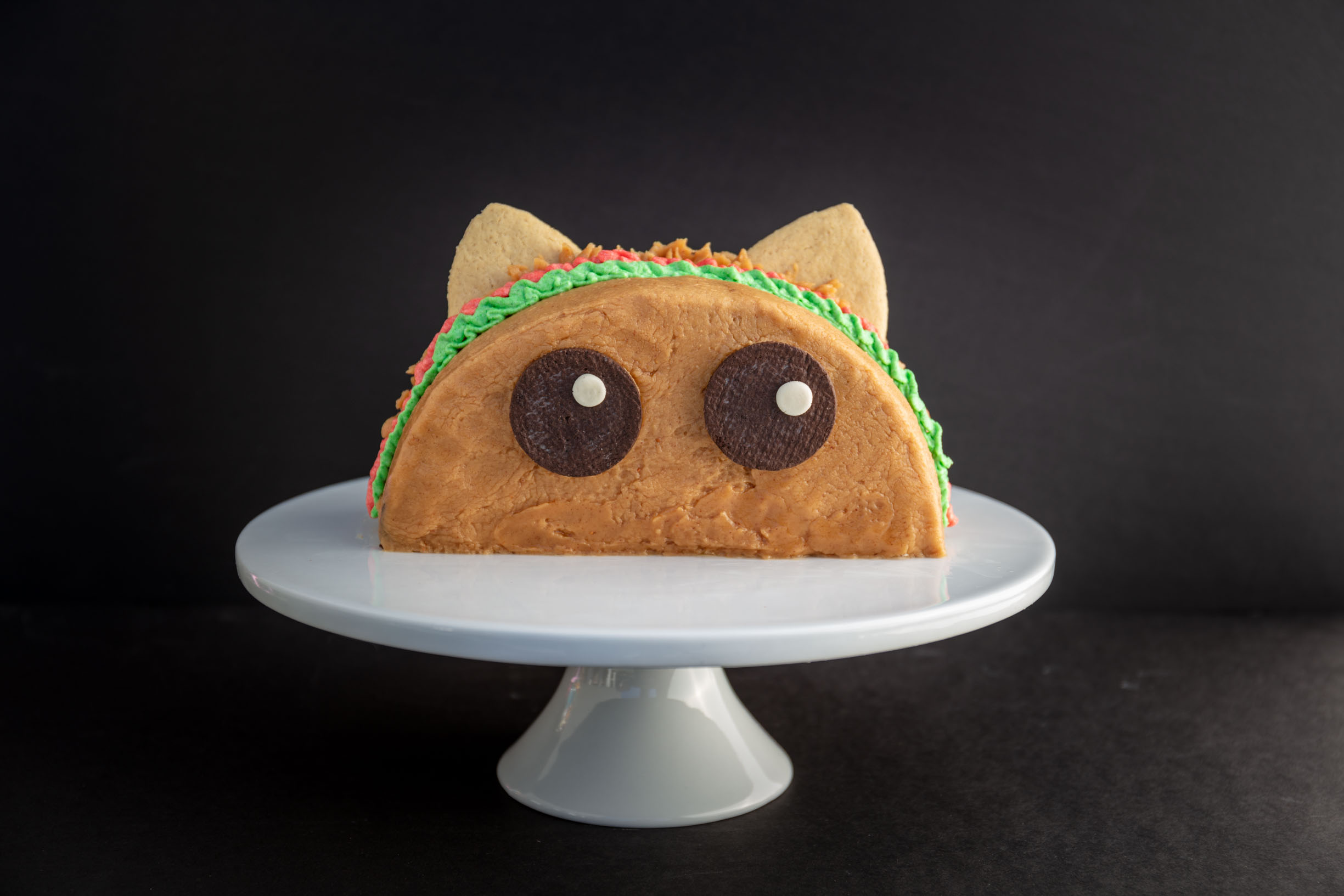 Cat shaped birthday cake with the name 