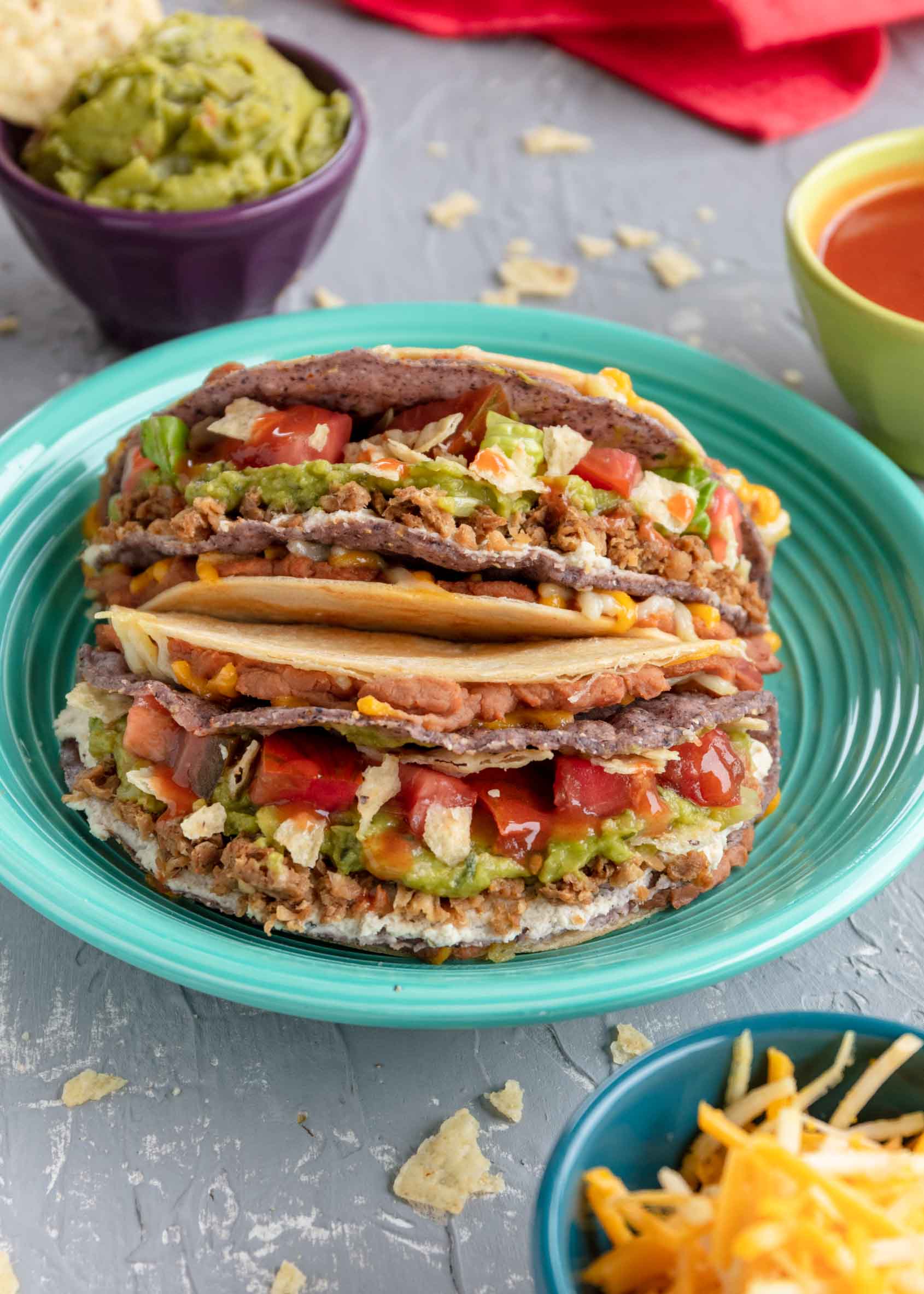 two vegan stuffed grilled tacos on a plate