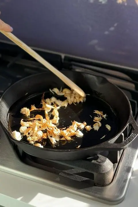 cooking the lion’s mane mushroom for the ravioli filling