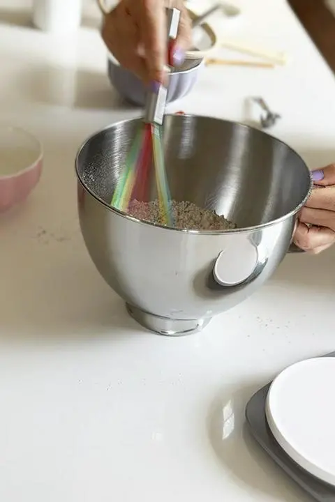 whisking the dry ingredients for the ravioli dough.