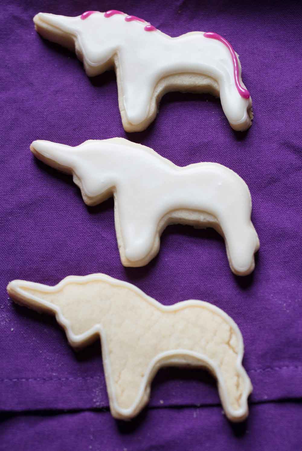 decorating vegan unicorn cookies