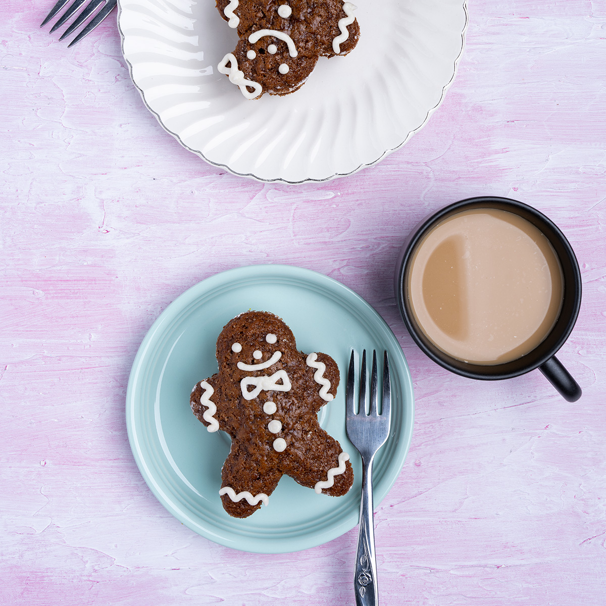 gingerbread cake on a pink and white board