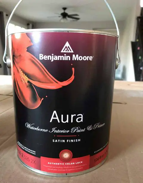 a can of Benjamin Moore Aura paint